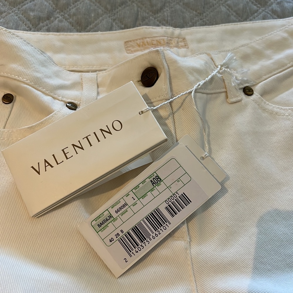Valentino Authentic   New with tags, white jeans size 8 for men or women